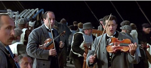 Scene from Titanic "Gentlemen it has been a privilege playing with you tonight"..... re Violin Jonathan Evans-Jones is a musician who plays Wallace Hartley in James Cameron 1997 film Titanic (on right of frame)